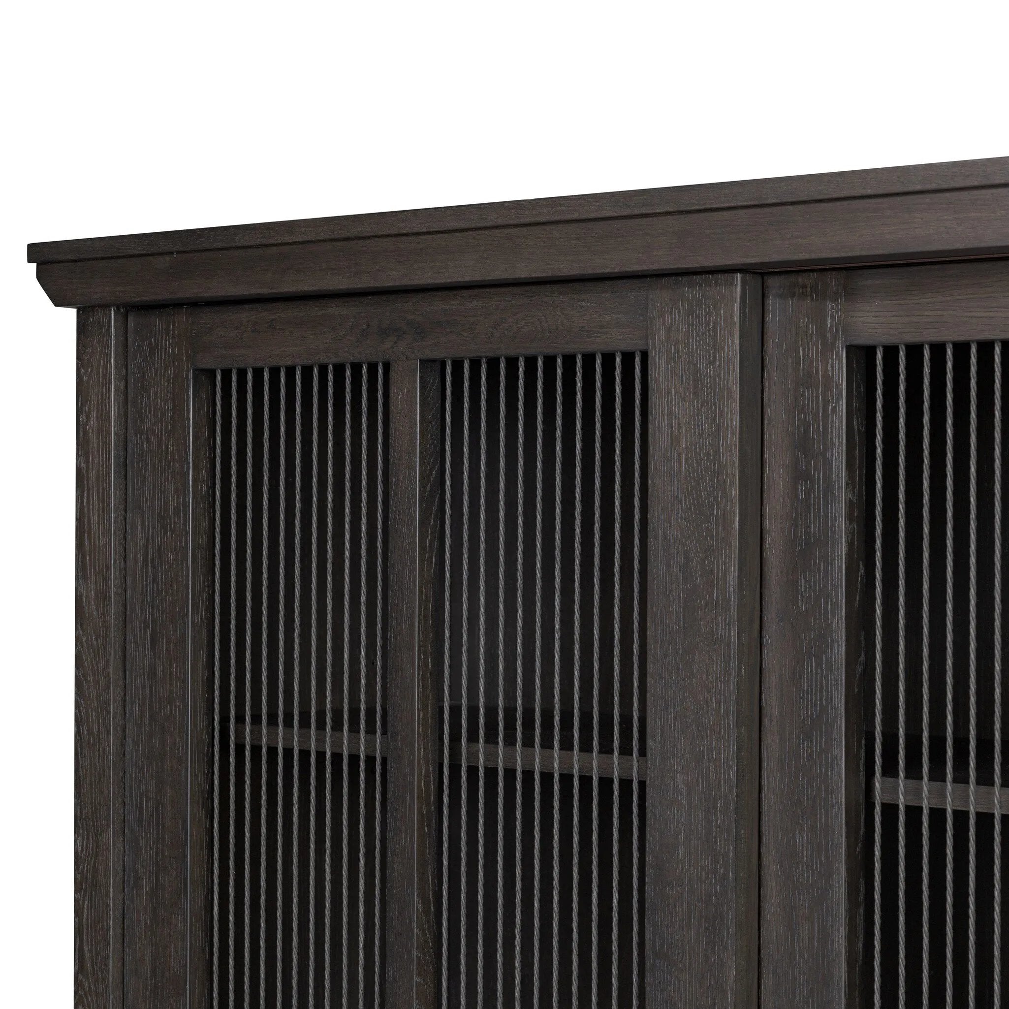 Long sliding doors with paper cord stripes inspired by Japanese teahouses bring a traditional look to this spacious cabinet. Made from oak in a smoked black finish, with a slightly oversized top.As lovers of luxe aesthetics at Amethyst, we love the optimistic inspired Tuscola Cabinet. Amethyst Home provides interior design, new home construction design consulting, vintage area rugs, and lighting in the Nashville metro area.