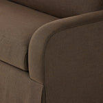 Meet the piece that can do it all. Coffee-colored fabric covers a long bench-style seat, while a concealed sleeper mechanism allows for easy pullout to transform this flexible piece into an extra bed. Curved slope arms finish into a fixed slipcover with kick-pleats at the front. Amethyst Home provides interior design, new home construction design consulting, vintage area rugs, and lighting in the Boston metro area.