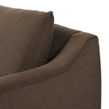 Meet the piece that can do it all. Coffee-colored fabric covers a long bench-style seat, while a concealed sleeper mechanism allows for easy pullout to transform this flexible piece into an extra bed. Curved slope arms finish into a fixed slipcover with kick-pleats at the front. Amethyst Home provides interior design, new home construction design consulting, vintage area rugs, and lighting in the Kansas City metro area.