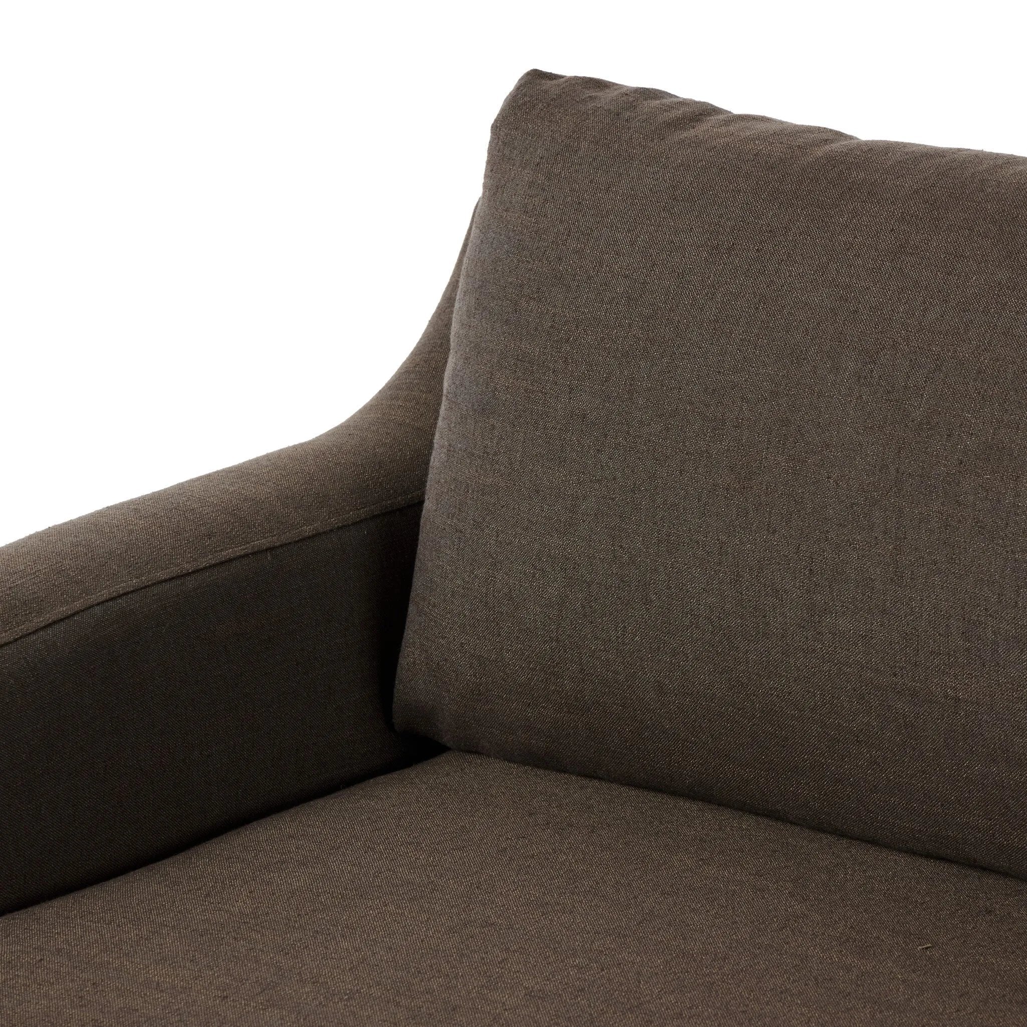 Meet the piece that can do it all. Coffee-colored fabric covers a long bench-style seat, while a concealed sleeper mechanism allows for easy pullout to transform this flexible piece into an extra bed. Curved slope arms finish into a fixed slipcover with kick-pleats at the front. Amethyst Home provides interior design, new home construction design consulting, vintage area rugs, and lighting in the Nashville metro area.