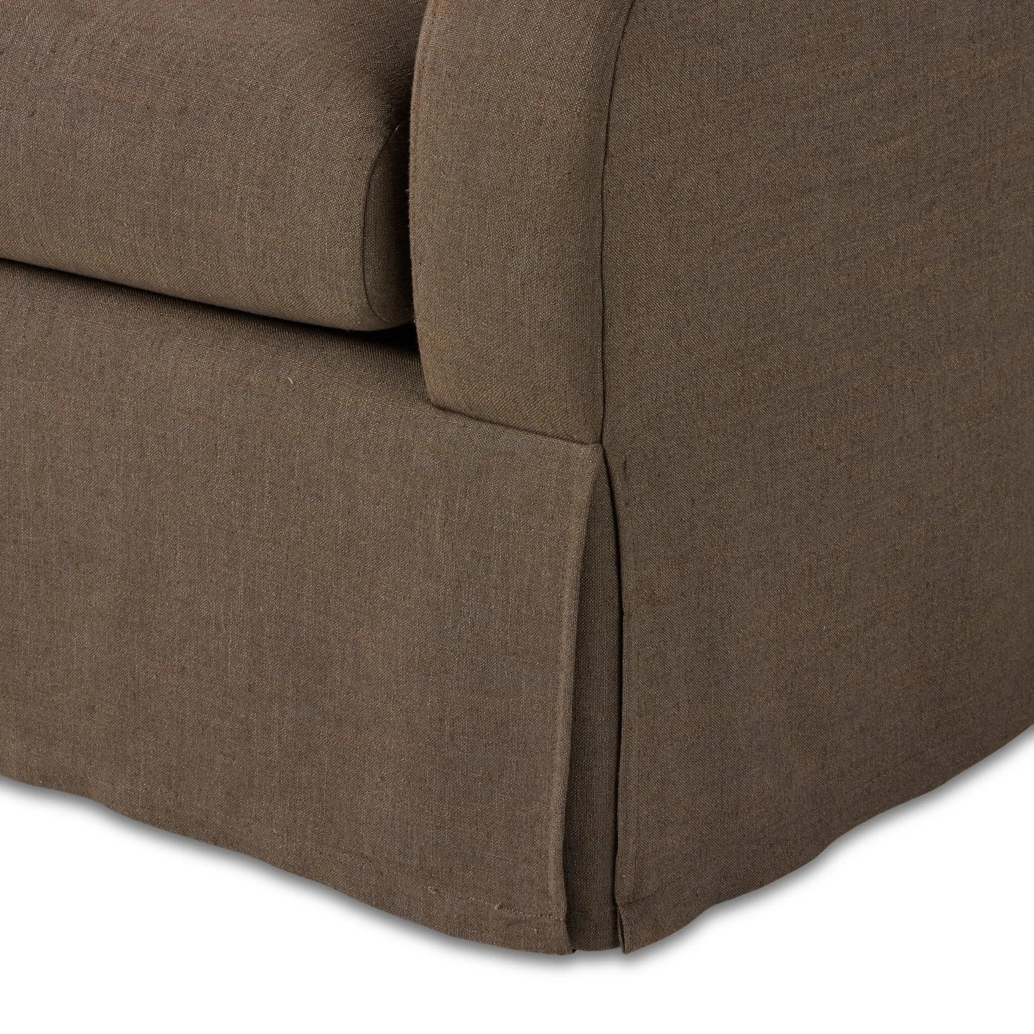 Meet the piece that can do it all. Coffee-colored fabric covers a long bench-style seat, while a concealed sleeper mechanism allows for easy pullout to transform this flexible piece into an extra bed. Curved slope arms finish into a fixed slipcover with kick-pleats at the front. Amethyst Home provides interior design, new home construction design consulting, vintage area rugs, and lighting in the Park City metro area.