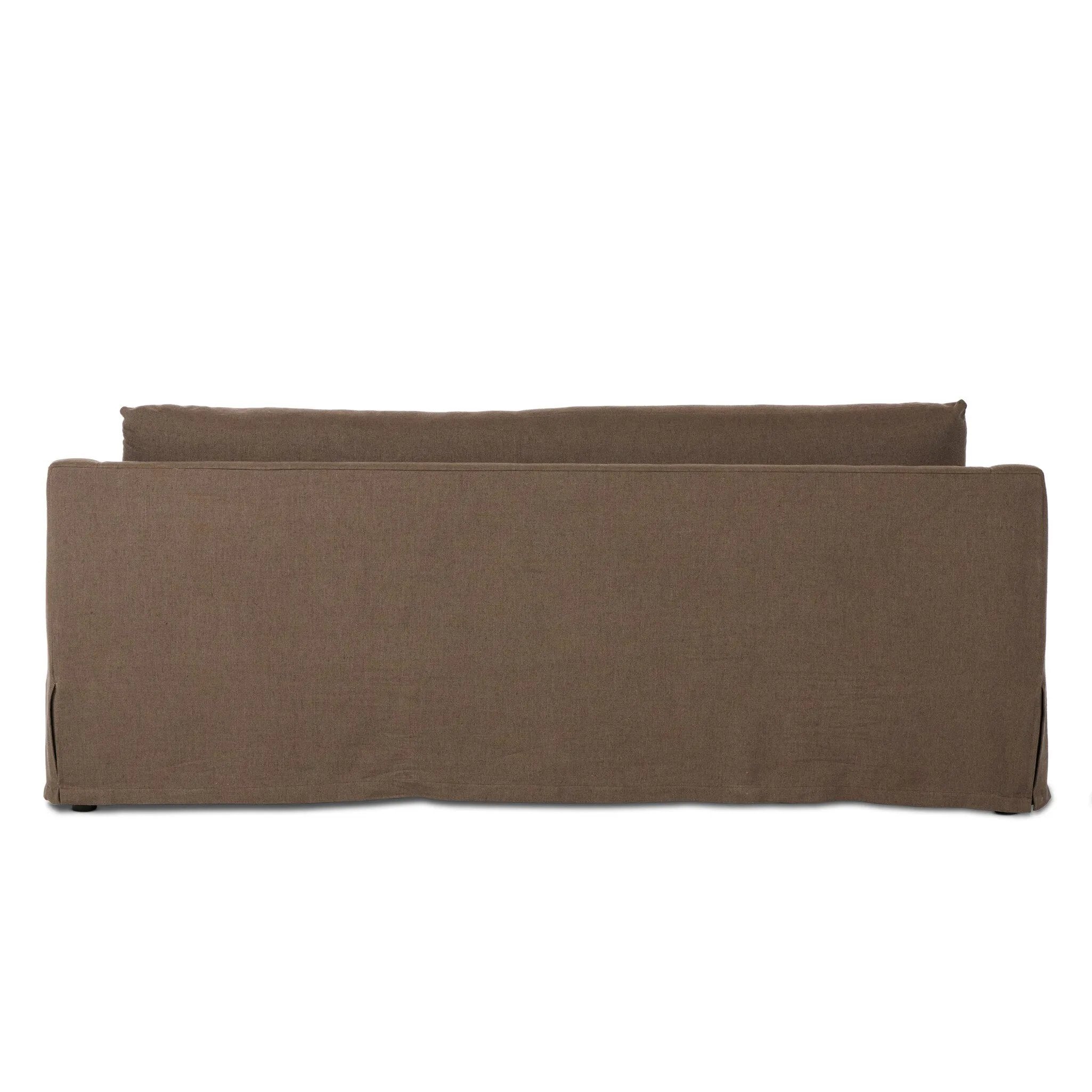 Meet the piece that can do it all. Coffee-colored fabric covers a long bench-style seat, while a concealed sleeper mechanism allows for easy pullout to transform this flexible piece into an extra bed. Curved slope arms finish into a fixed slipcover with kick-pleats at the front. Amethyst Home provides interior design, new home construction design consulting, vintage area rugs, and lighting in the Portland metro area.