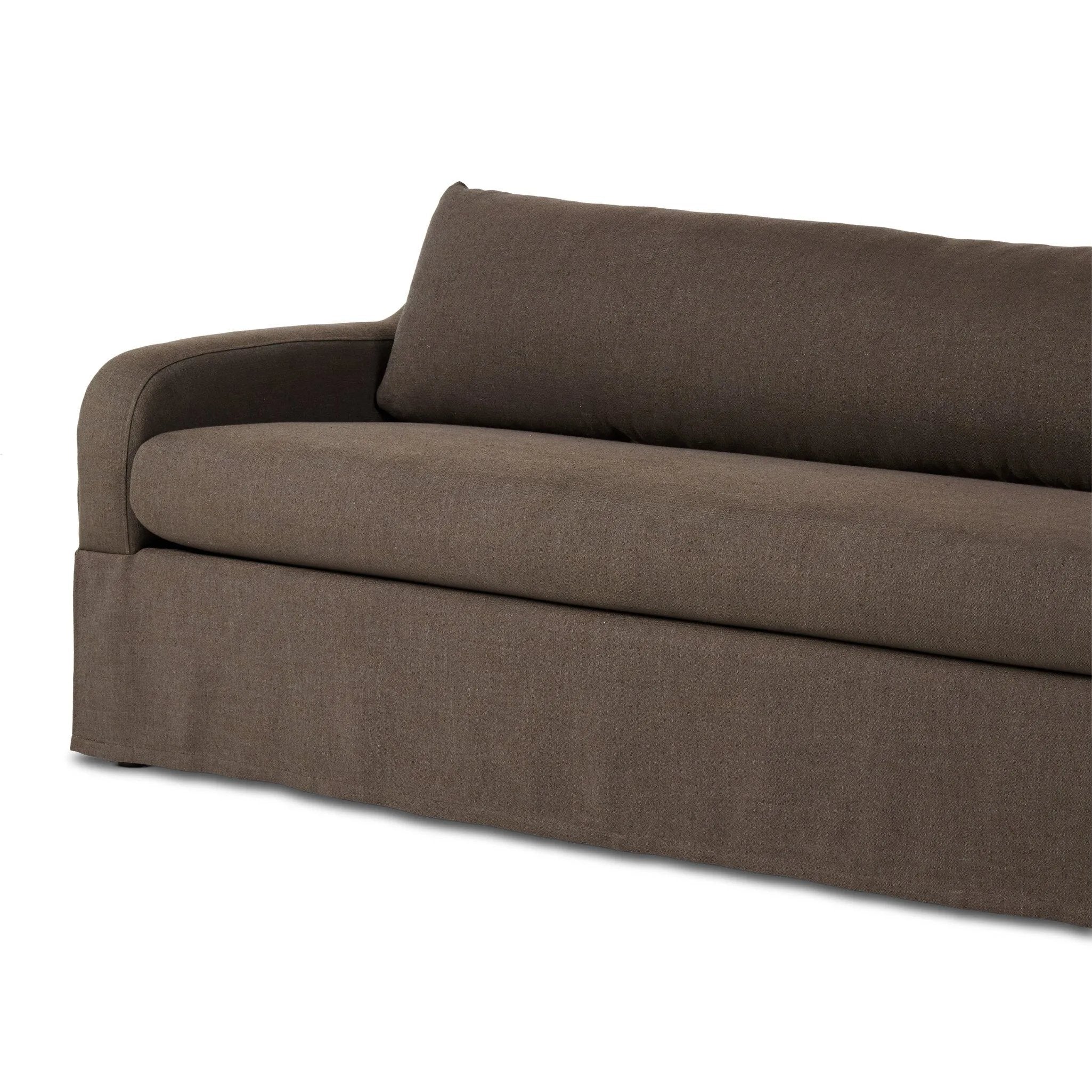 Meet the piece that can do it all. Coffee-colored fabric covers a long bench-style seat, while a concealed sleeper mechanism allows for easy pullout to transform this flexible piece into an extra bed. Curved slope arms finish into a fixed slipcover with kick-pleats at the front. Amethyst Home provides interior design, new home construction design consulting, vintage area rugs, and lighting in the Salt Lake City metro area.