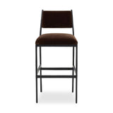 A metal frame with a tapered profile pairs with a velvety brown upholstered seat and back, striking balance in both scale in texture. Perfectly scaled for the counter.As lovers of wabi sabi design at Amethyst, we love the warm modern inspired Valeene Bar + Counter Stool. Amethyst Home provides interior design, new home construction design consulting, vintage area rugs, and lighting in the Houston metro area.
