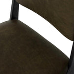 A metal frame with a tapered profile pairs with a moss-colored top-grain leather seat and back, striking balance in both scale in texture.As fans of wabi sabi aesthetics at Amethyst, we love the optimistic inspired Valeene Dining Chair - Dulane Moss. This item pairs well with other brands such as Surya and is perfect for minimalist homes Amethyst Home provides interior design, new home construction design consulting, vintage area rugs, and lighting in the Calabasas metro area.