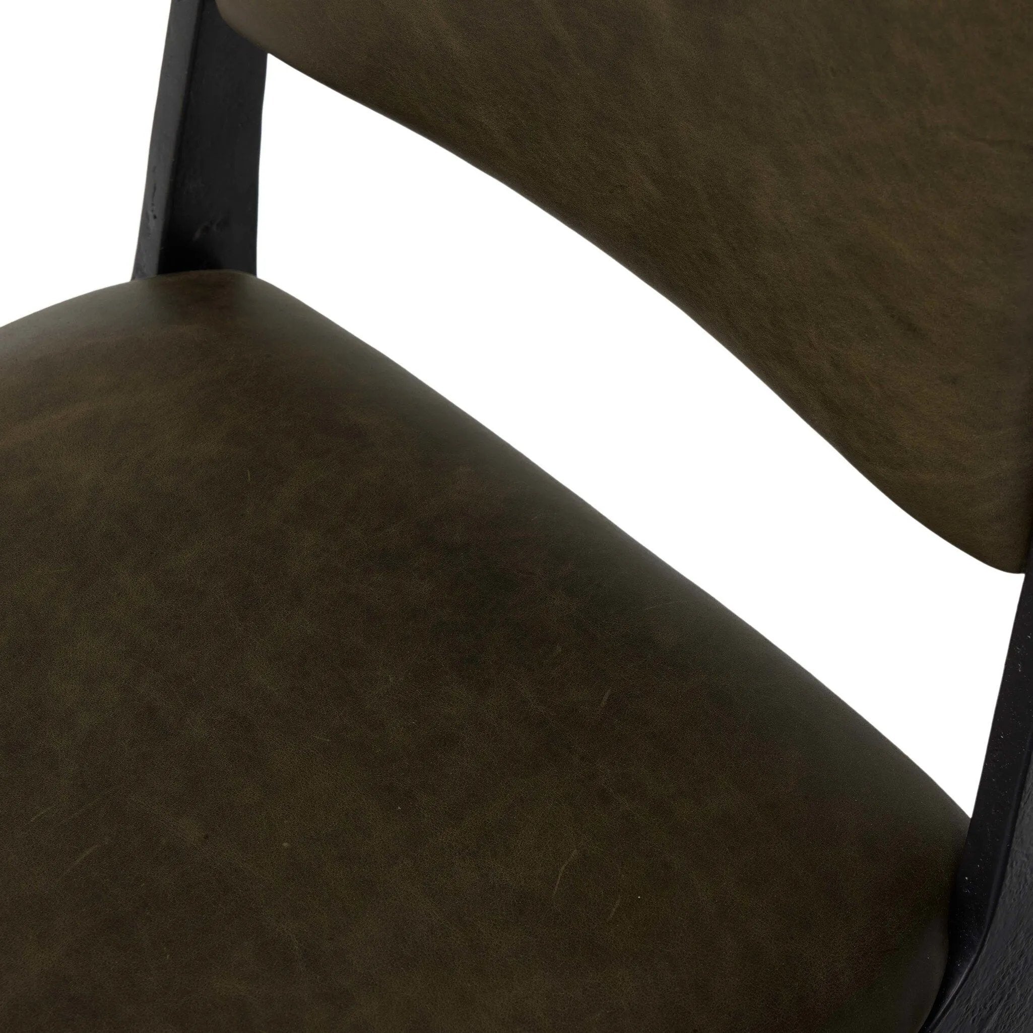 A metal frame with a tapered profile pairs with a moss-colored top-grain leather seat and back, striking balance in both scale in texture.As fans of wabi sabi aesthetics at Amethyst, we love the optimistic inspired Valeene Dining Chair - Dulane Moss. This item pairs well with other brands such as Surya and is perfect for minimalist homes Amethyst Home provides interior design, new home construction design consulting, vintage area rugs, and lighting in the Calabasas metro area.