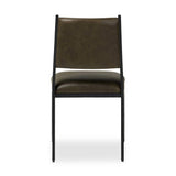 A metal frame with a tapered profile pairs with a moss-colored top-grain leather seat and back, striking balance in both scale in texture.As fans of wabi sabi aesthetics at Amethyst, we love the optimistic inspired Valeene Dining Chair - Dulane Moss. This item pairs well with other brands such as Surya and is perfect for minimalist homes Amethyst Home provides interior design, new home construction design consulting, vintage area rugs, and lighting in the Monterey metro area.