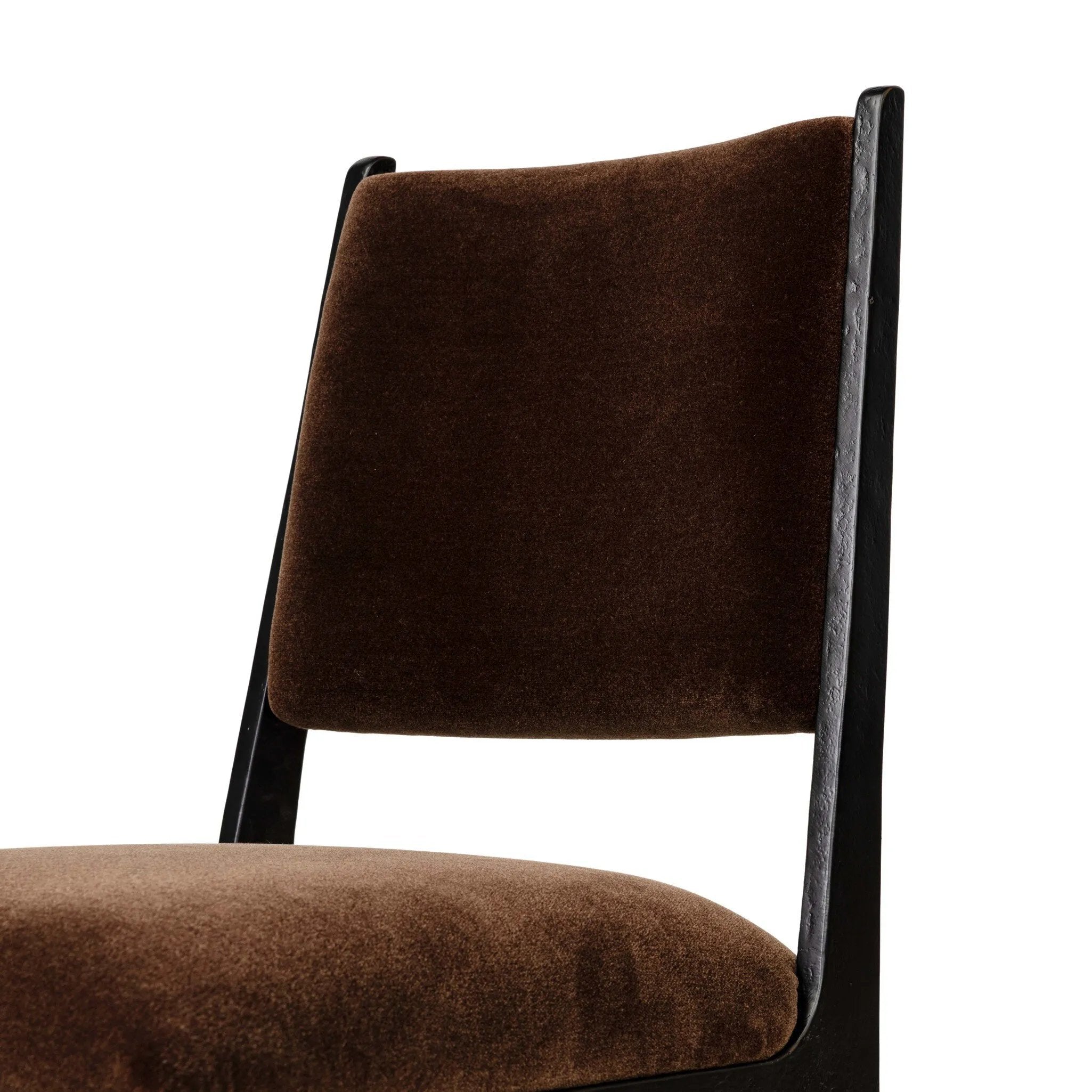 A metal frame with a tapered profile pairs with a velvety brown upholstered seat and back, striking balance in both scale in texture.As lovers of natural aesthetics at Amethyst, we love the warm modern inspired Valeene Dining Chair - Monte Chocolate. This item pairs well with other brands such as Four Hands and is perfect for loft homes Amethyst Home provides interior design, new home construction design consulting, vintage area rugs, and lighting in the Dallas metro area.