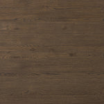 Made from rustic brown oak, a rectangular coffee table is streamlined while not short on presence, with its exaggerated cylinder legs and polished pill-shaped top Amethyst Home provides interior design, new home construction design consulting, vintage area rugs, and lighting in the Austin metro area.