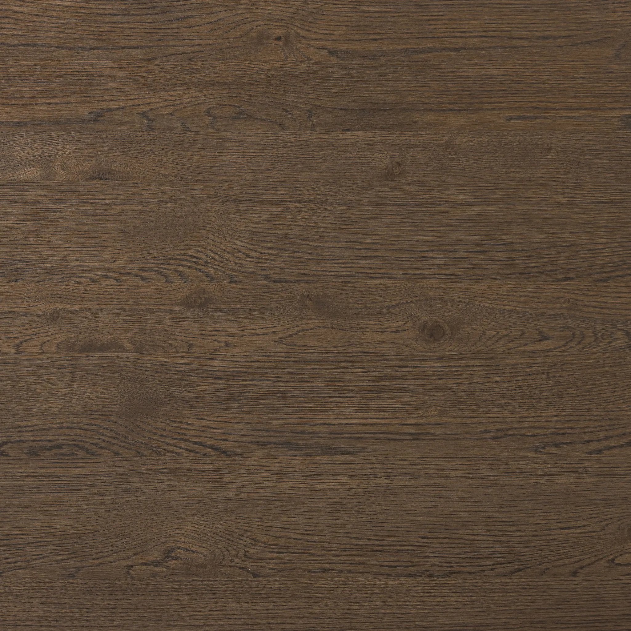 Made from rustic brown oak, a rectangular coffee table is streamlined while not short on presence, with its exaggerated cylinder legs and polished pill-shaped top Amethyst Home provides interior design, new home construction design consulting, vintage area rugs, and lighting in the Austin metro area.