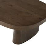 Made from rustic brown oak, a rectangular coffee table is streamlined while not short on presence, with its exaggerated cylinder legs and polished pill-shaped top Amethyst Home provides interior design, new home construction design consulting, vintage area rugs, and lighting in the Calabasas metro area.
