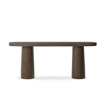 Featuring Valen Rustic Brown Oak Veneer Console Table by Four Hands at Amethyst Home. Made from rustic brown oak, an open-style console table is streamlined while not short on presence, with its exaggerated cylinder legs and polished pill-shaped top.Overall Dimensions: 78.00"w x 18.00"d x 32.00"hWeight : 99.21 lbsMaterials: Oak Veneer, Oak Plywood. Amethyst Home provides interior design, new home construction design consulting, vintage area rugs, and lighting in the Los Angeles metro area.