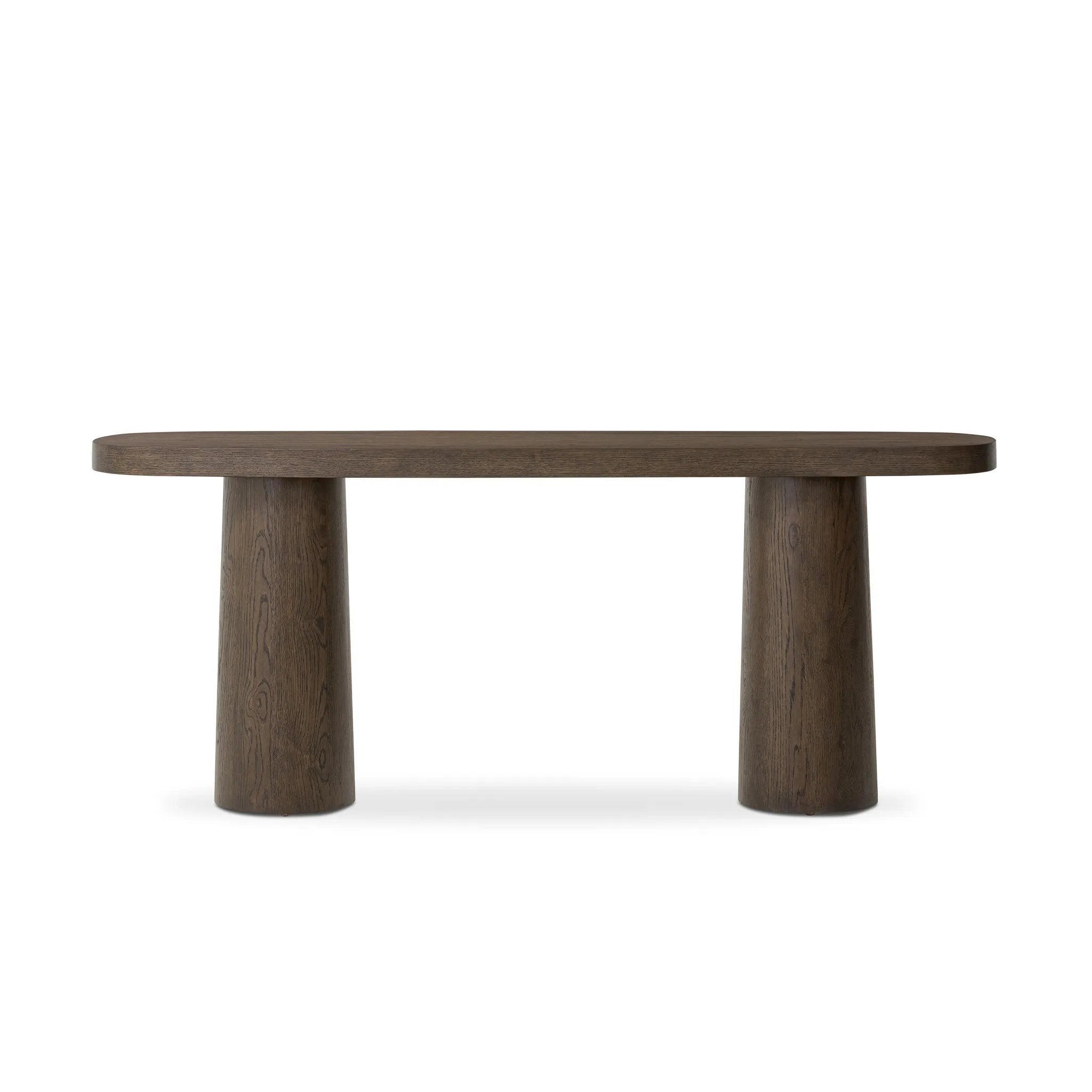 Made from rustic brown oak, an open-style console table is streamlined while not short on presence, with its exaggerated cylinder legs and polished pill-shaped top Amethyst Home provides interior design, new home construction design consulting, vintage area rugs, and lighting in the Los Angeles metro area.