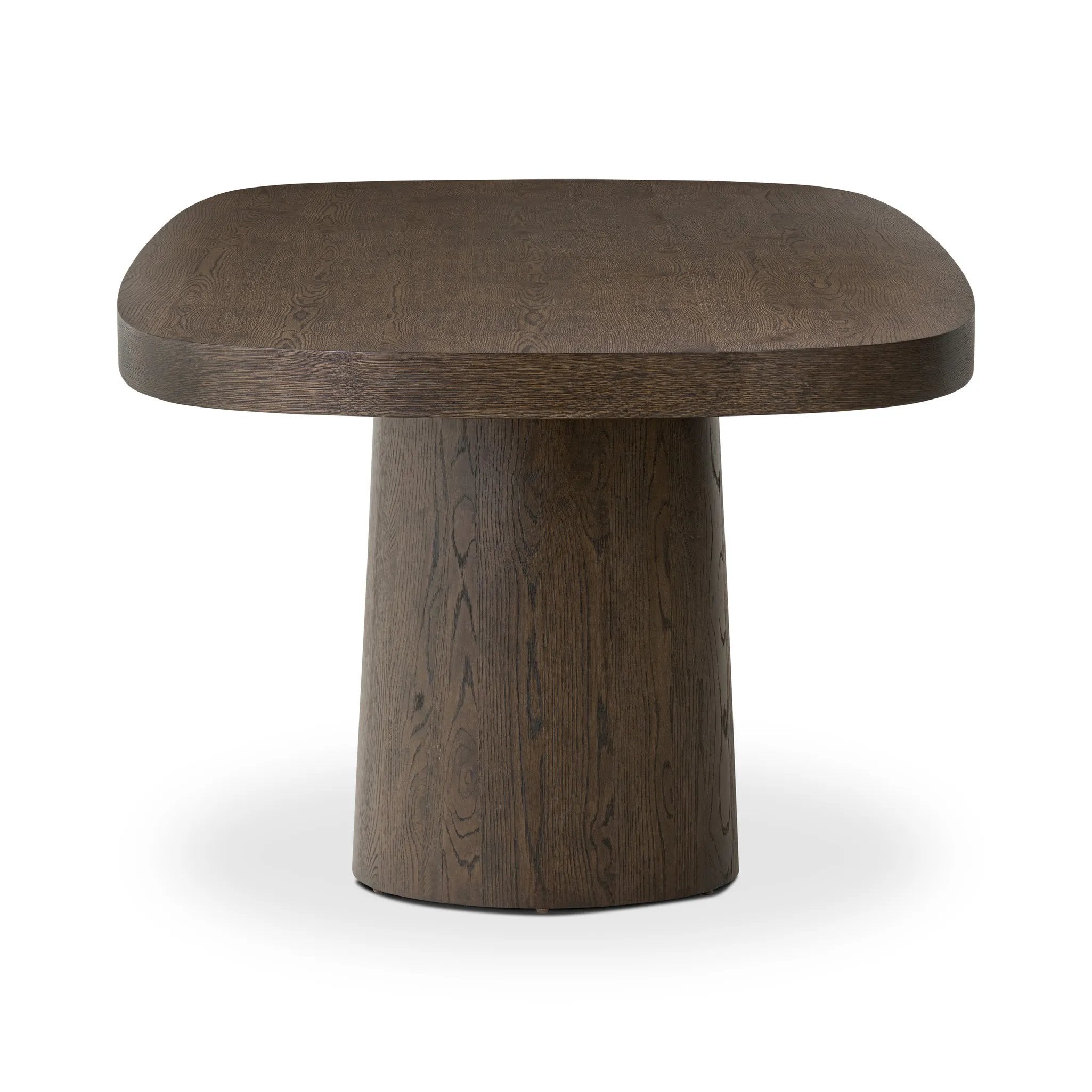 Featuring Valen Rustic Brown Oak Veneer Dining Table by Four Hands at Amethyst Home. Smooth and shapely with heavy proportions, exaggerated cylinder legs pair with a softened pill-shaped top, with subtly arched sides. Made from oak veneer with a rustic brown finish, for a warm, welcoming look.Overall Dimensions: 108.00"w x 45.00"d x 30.00"hWeight : 254.63 l. Amethyst Home provides interior design, new home construction design consulting, vintage area rugs, and lighting in the Charlotte metro area.