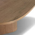 Center your dining space with a beautifully simple style inspired by soft Brutalism. Made from solid mindi with a light, sandy finish, this monolithic piece features a unique "squircle" tabletop, with flowing curves on its edges. A substantial plinth base is rotated to a 45-degree angle to highlight this piece's playful shaping Amethyst Home provides interior design, new home construction design consulting, vintage area rugs, and lighting in the Los Angeles metro area.