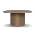 Center your dining space with a beautifully simple style inspired by soft Brutalism. Made from solid mindi with a light, sandy finish, this monolithic piece features a unique "squircle" tabletop, with flowing curves on its edges. A substantial plinth base is rotated to a 45-degree angle to highlight this piece's playful shaping Amethyst Home provides interior design, new home construction design consulting, vintage area rugs, and lighting in the Monterey metro area.
