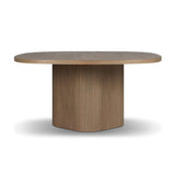 Center your dining space with a beautifully simple style inspired by soft Brutalism. Made from solid mindi with a light, sandy finish, this monolithic piece features a unique "squircle" tabletop, with flowing curves on its edges. A substantial plinth base is rotated to a 45-degree angle to highlight this piece's playful shaping Amethyst Home provides interior design, new home construction design consulting, vintage area rugs, and lighting in the Portland metro area.