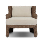 This outdoor chair's sculpted shape mimics classic wingback armchairs, with a double-twist woven material framing heavily textured boucle fabric for added visual weight. Cover or store inside during inclement weather or when not in use. Amethyst Home provides interior design, new home construction design consulting, vintage area rugs, and lighting in the Newport Beach metro area.