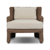 This outdoor chair's sculpted shape mimics classic wingback armchairs, with a double-twist woven material framing heavily textured boucle fabric for added visual weight. Cover or store inside during inclement weather or when not in use. Amethyst Home provides interior design, new home construction design consulting, vintage area rugs, and lighting in the Newport Beach metro area.