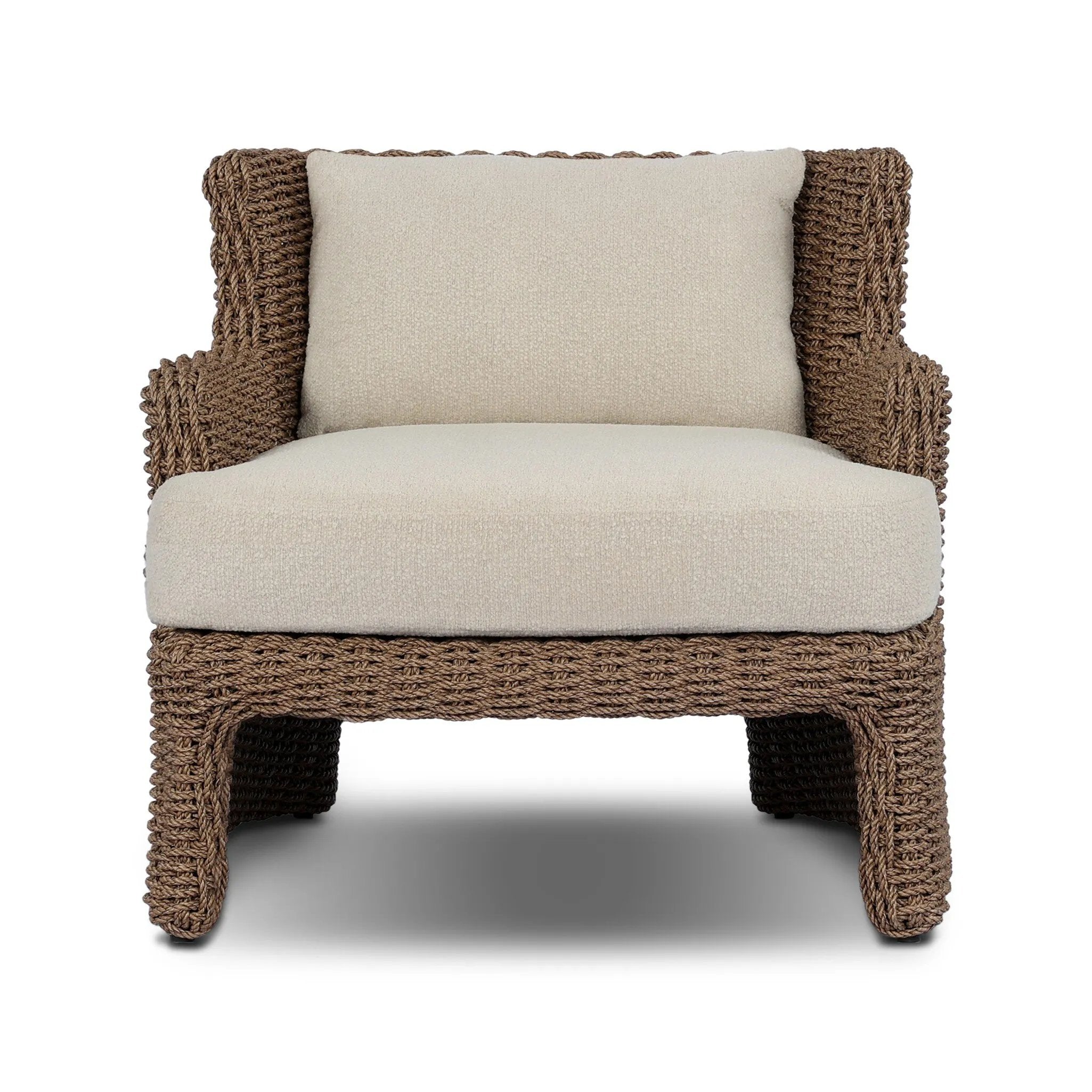 This outdoor chair's sculpted shape mimics classic wingback armchairs, with a double-twist woven material framing heavily textured boucle fabric for added visual weight. Cover or store inside during inclement weather or when not in use. Amethyst Home provides interior design, new home construction design consulting, vintage area rugs, and lighting in the Newport Beach metro area.