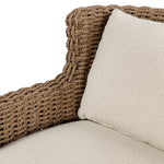 This outdoor chair's sculpted shape mimics classic wingback armchairs, with a double-twist woven material framing heavily textured boucle fabric for added visual weight. Cover or store inside during inclement weather or when not in use. Amethyst Home provides interior design, new home construction design consulting, vintage area rugs, and lighting in the Scottsdale metro area.