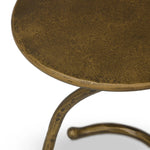 Featuring Vera Hammered Aged Brass End Table by Four Hands at Amethyst Home. A low-profile end table features a snake-like base finished in a hammered aged brass. Perfectly sized to keep your favorite drink or book within reach, to make your evening ritual a little smoother. Overall Dimensions: 16.00"w x 16.00"d x 18.75"h. Amethyst Home provides interior design, new home construction design consulting, vintage area rugs, and lighting in the Des Moines metro area.