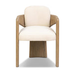 Striking from every view. This statement-making chair combines beautiful natural oak in tripod form with high-performance fabric. The cantilever design, with a wide plank back and sloping arms, form an eye-catching silhouette for the floating seat and overflowing back cushion. Amethyst Home provides interior design, new home construction design consulting, vintage area rugs, and lighting in the Alpharetta metro area.
