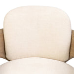 Striking from every view. This statement-making chair combines beautiful natural oak in tripod form with high-performance fabric. The cantilever design, with a wide plank back and sloping arms, form an eye-catching silhouette for the floating seat and overflowing back cushion. Amethyst Home provides interior design, new home construction design consulting, vintage area rugs, and lighting in the Dallas metro area.