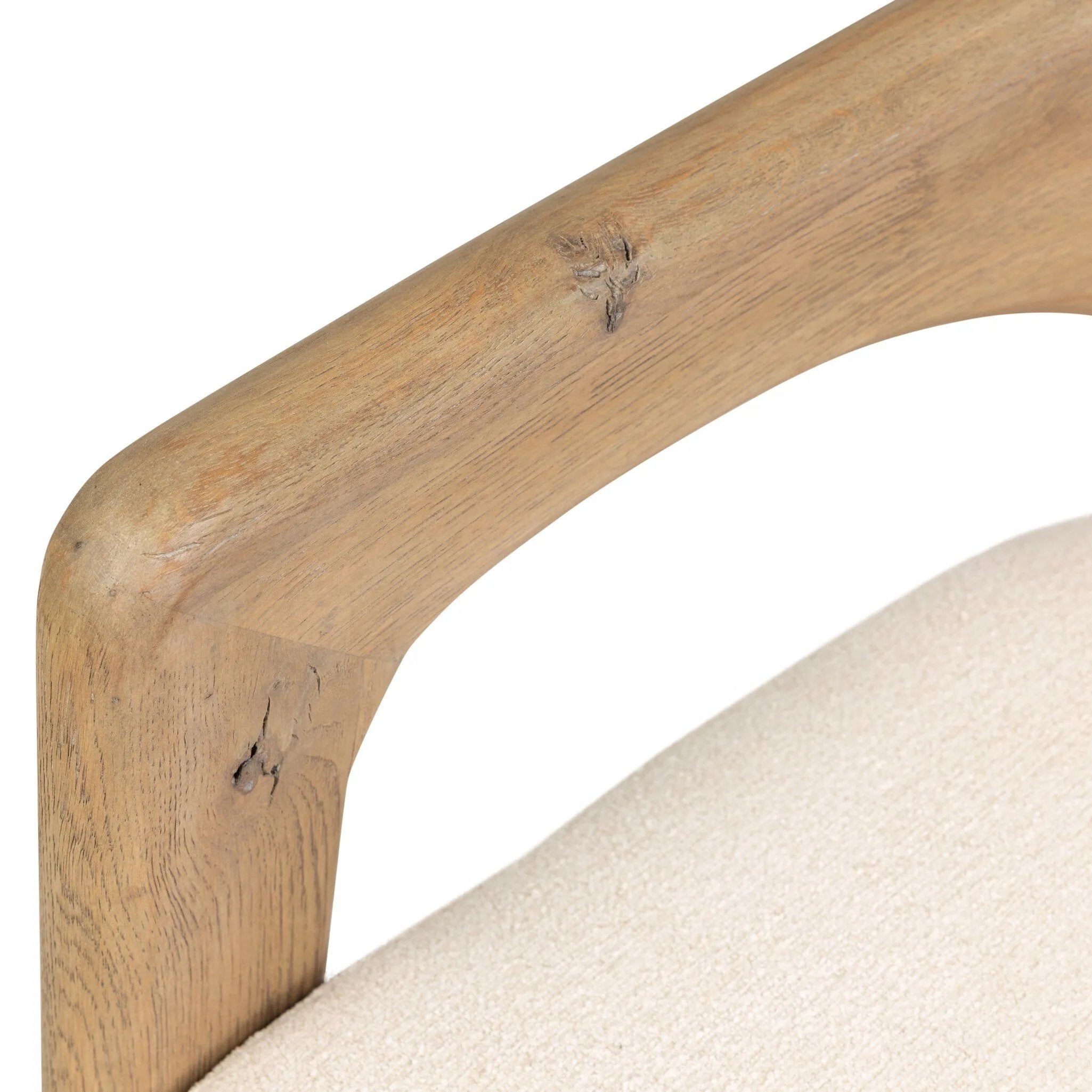 Striking from every view. This statement-making chair combines beautiful natural oak in tripod form with high-performance fabric. The cantilever design, with a wide plank back and sloping arms, form an eye-catching silhouette for the floating seat and overflowing back cushion. Amethyst Home provides interior design, new home construction design consulting, vintage area rugs, and lighting in the Newport Beach metro area.
