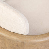 Striking from every view. This statement-making chair combines beautiful natural oak in tripod form with high-performance fabric. The cantilever design, with a wide plank back and sloping arms, form an eye-catching silhouette for the floating seat and overflowing back cushion. Amethyst Home provides interior design, new home construction design consulting, vintage area rugs, and lighting in the Salt Lake City metro area.