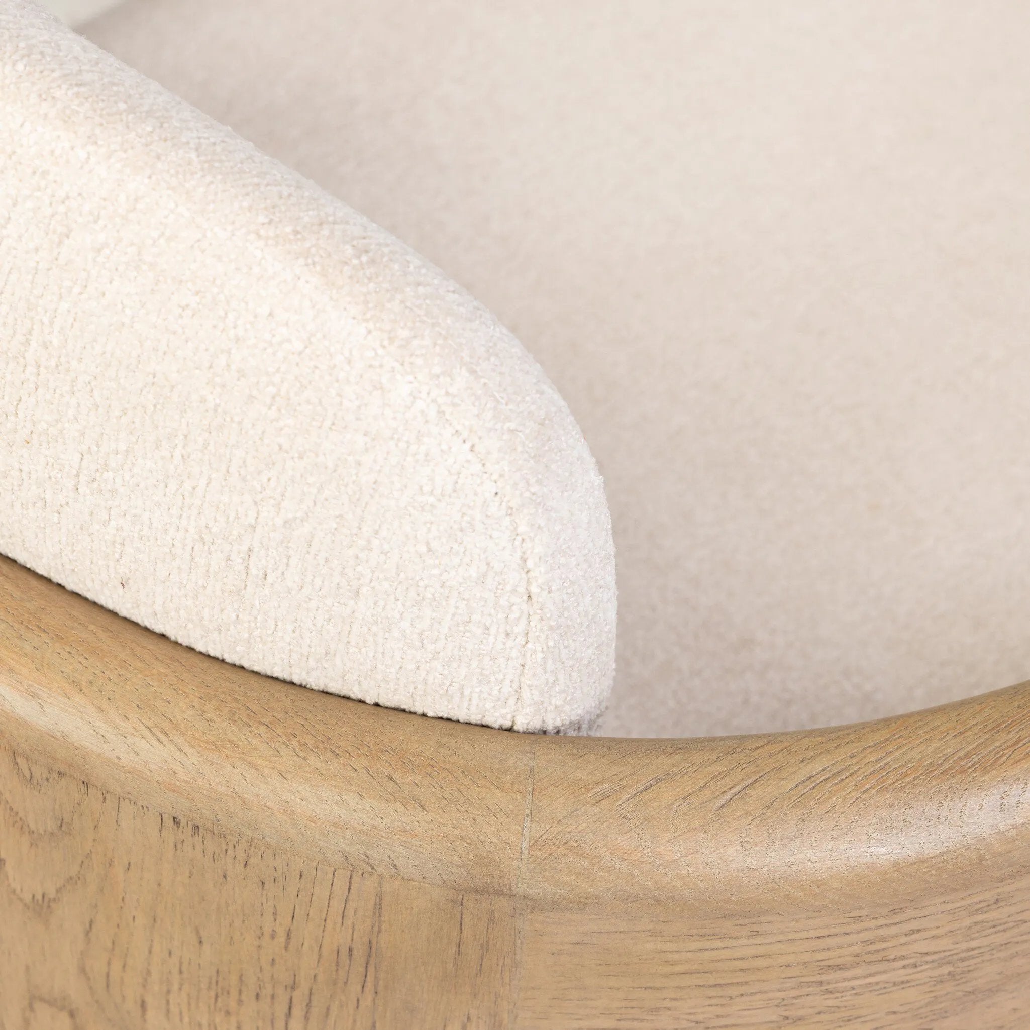 Striking from every view. This statement-making chair combines beautiful natural oak in tripod form with high-performance fabric. The cantilever design, with a wide plank back and sloping arms, form an eye-catching silhouette for the floating seat and overflowing back cushion. Amethyst Home provides interior design, new home construction design consulting, vintage area rugs, and lighting in the Salt Lake City metro area.