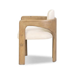 Striking from every view. This statement-making chair combines beautiful natural oak in tripod form with high-performance fabric. The cantilever design, with a wide plank back and sloping arms, form an eye-catching silhouette for the floating seat and overflowing back cushion. Amethyst Home provides interior design, new home construction design consulting, vintage area rugs, and lighting in the San Diego metro area.