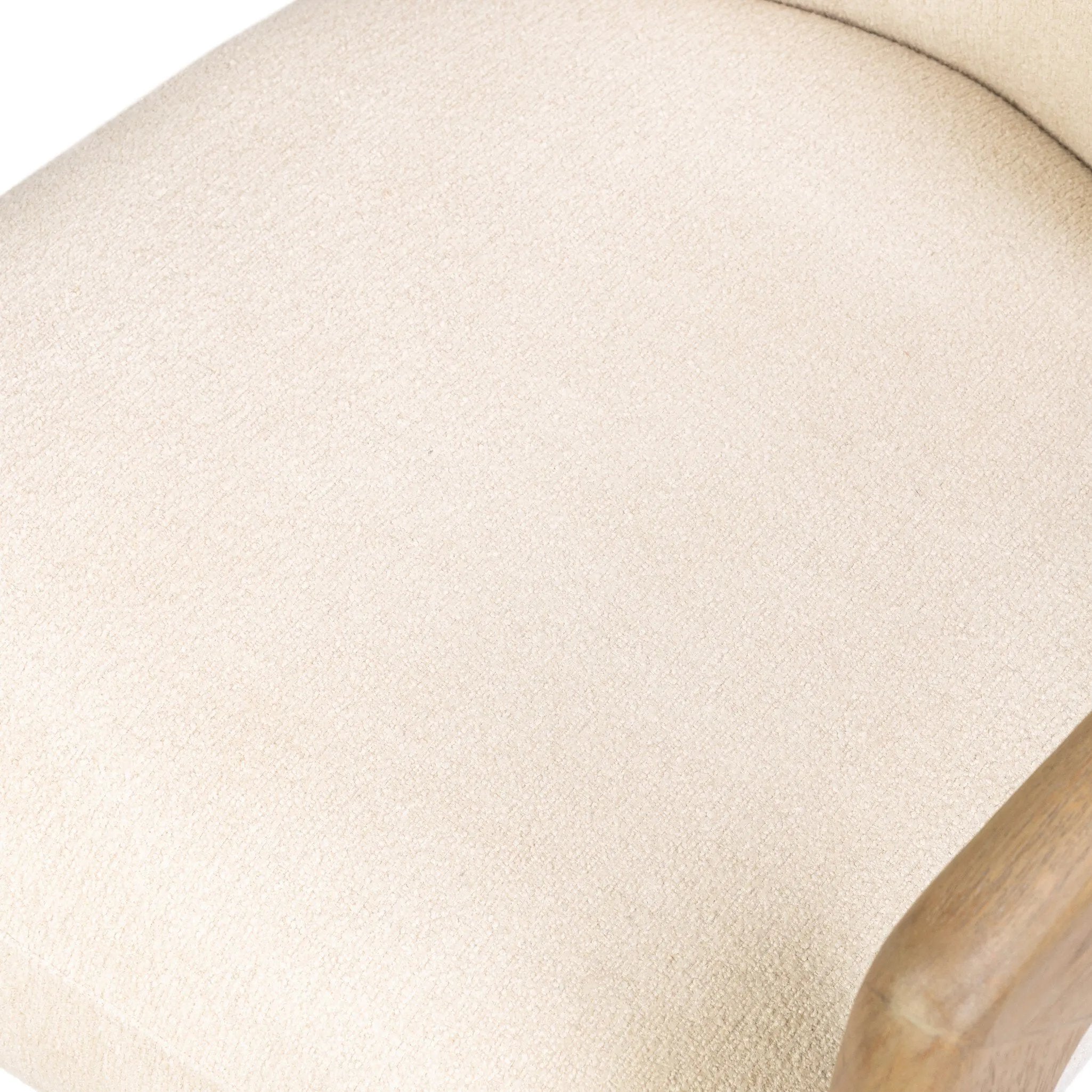 Striking from every view. This statement-making chair combines beautiful natural oak in tripod form with high-performance fabric. The cantilever design, with a wide plank back and sloping arms, form an eye-catching silhouette for the floating seat and overflowing back cushion. Amethyst Home provides interior design, new home construction design consulting, vintage area rugs, and lighting in the Seattle metro area.