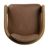 Striking from every view. This statement-making dining chair combines solid oak in tripod form with top-grain leather. The cantilever design, with a wide plank back and sloping arms, form an eye-catching silhouette for the floating seat and overflowing back cushion. Amethyst Home provides interior design, new home construction design consulting, vintage area rugs, and lighting in the Los Angeles metro area.