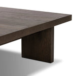 A squared coffee table of rich oak veneer meets clean lines with wide proportions, bringing a beautifully natural look to your living space Amethyst Home provides interior design, new home construction design consulting, vintage area rugs, and lighting in the Dallas metro area.