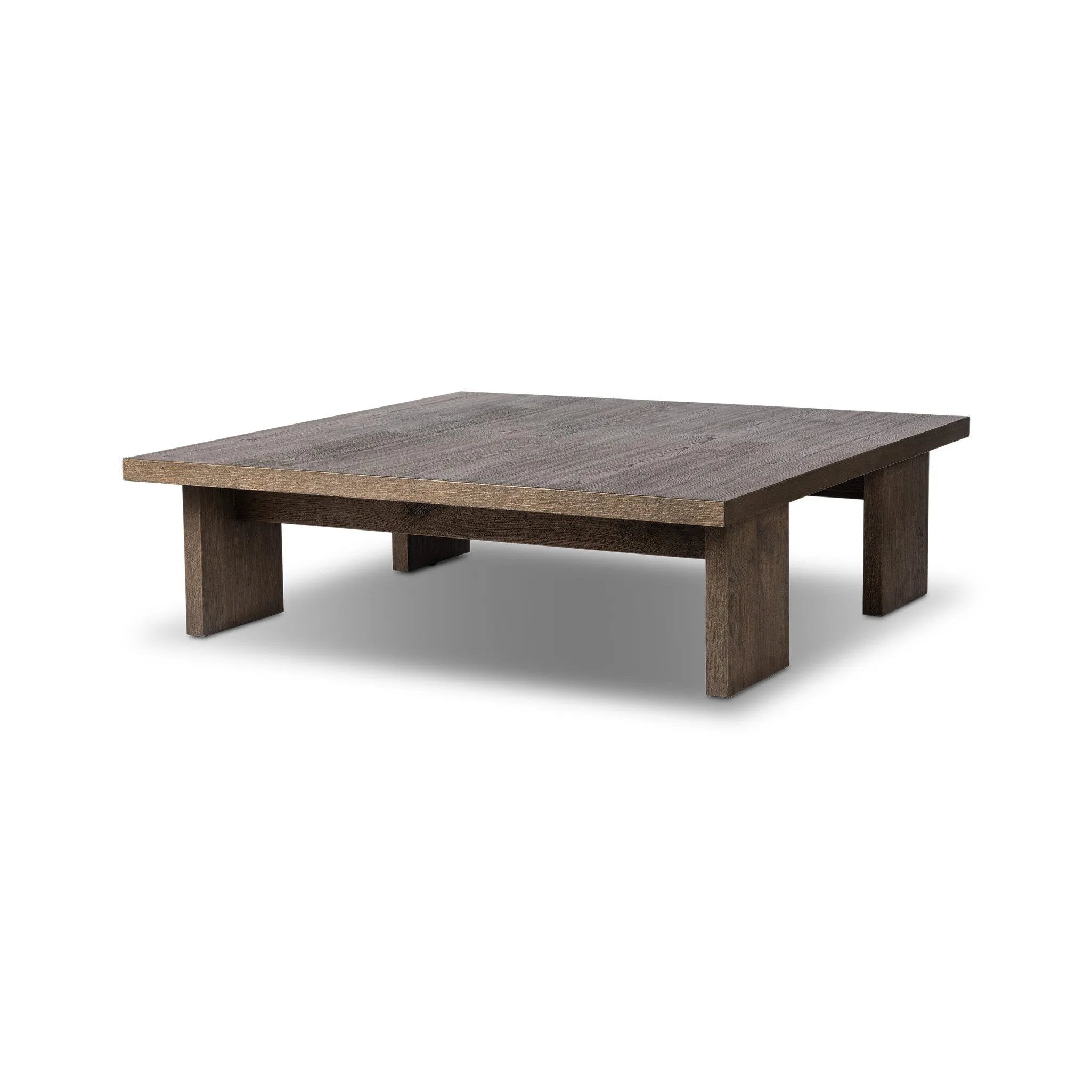 A squared coffee table of rich oak veneer meets clean lines with wide proportions, bringing a beautifully natural look to your living space Amethyst Home provides interior design, new home construction design consulting, vintage area rugs, and lighting in the Des Moines metro area.