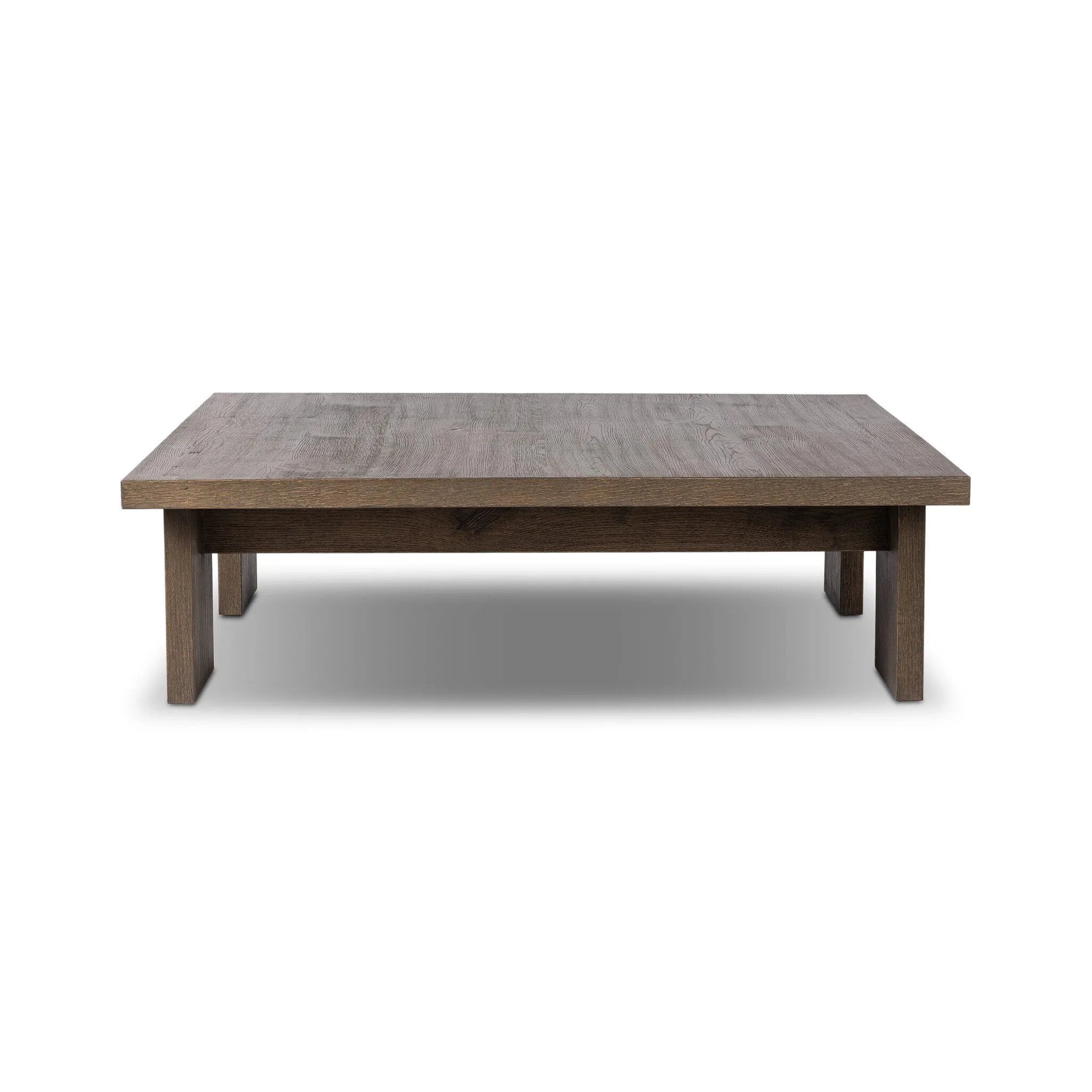 A squared coffee table of rich oak veneer meets clean lines with wide proportions, bringing a beautifully natural look to your living space Amethyst Home provides interior design, new home construction design consulting, vintage area rugs, and lighting in the Monterey metro area.