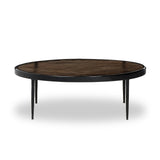 Smoky brown glass-topped table with slim, tapered matte black metal frames for a sleek, modern look. Part of a nesting set, can be used alone or paired with its smaller counterpart Amethyst Home provides interior design, new home construction design consulting, vintage area rugs, and lighting in the Austin metro area.