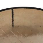 Smoky brown glass-topped table with slim, tapered matte black metal frames for a sleek, modern look. Part of a nesting set, can be used alone or paired with its smaller counterpart Amethyst Home provides interior design, new home construction design consulting, vintage area rugs, and lighting in the Dallas metro area.