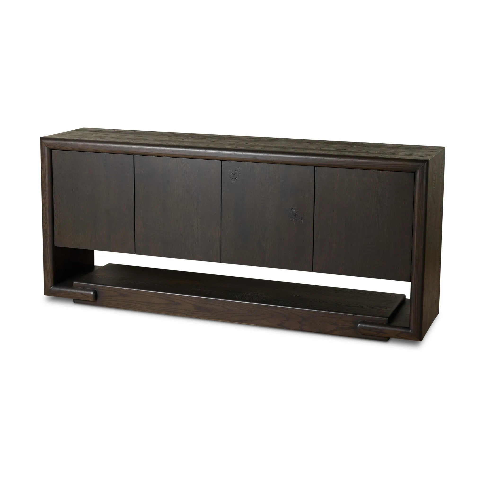 Store favorite table linens and serveware in an oak sideboard with a unique float-like appearance. A thick base doubles as bonus shelving, with inserted waterfall framing lifting up the full case. Finished in a smoked black to showcase gorgeous wood character. Amethyst Home provides interior design, new home construction design consulting, vintage area rugs, and lighting in the Houston metro area.