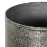 Futuristic-like metal with an antiqued finish, shaped into a cast planter with textural movement that catches the light. Safe for any space, indoor or out. Cover or store indoors during inclement weather and when not in use.As enthusiasts of natural style at Amethyst, we love the designer inspired Zavia Metal Planter - Raw Antique Nickel. Amethyst Home provides interior design, new home construction design consulting, vintage area rugs, and lighting in the Des Moines metro area.