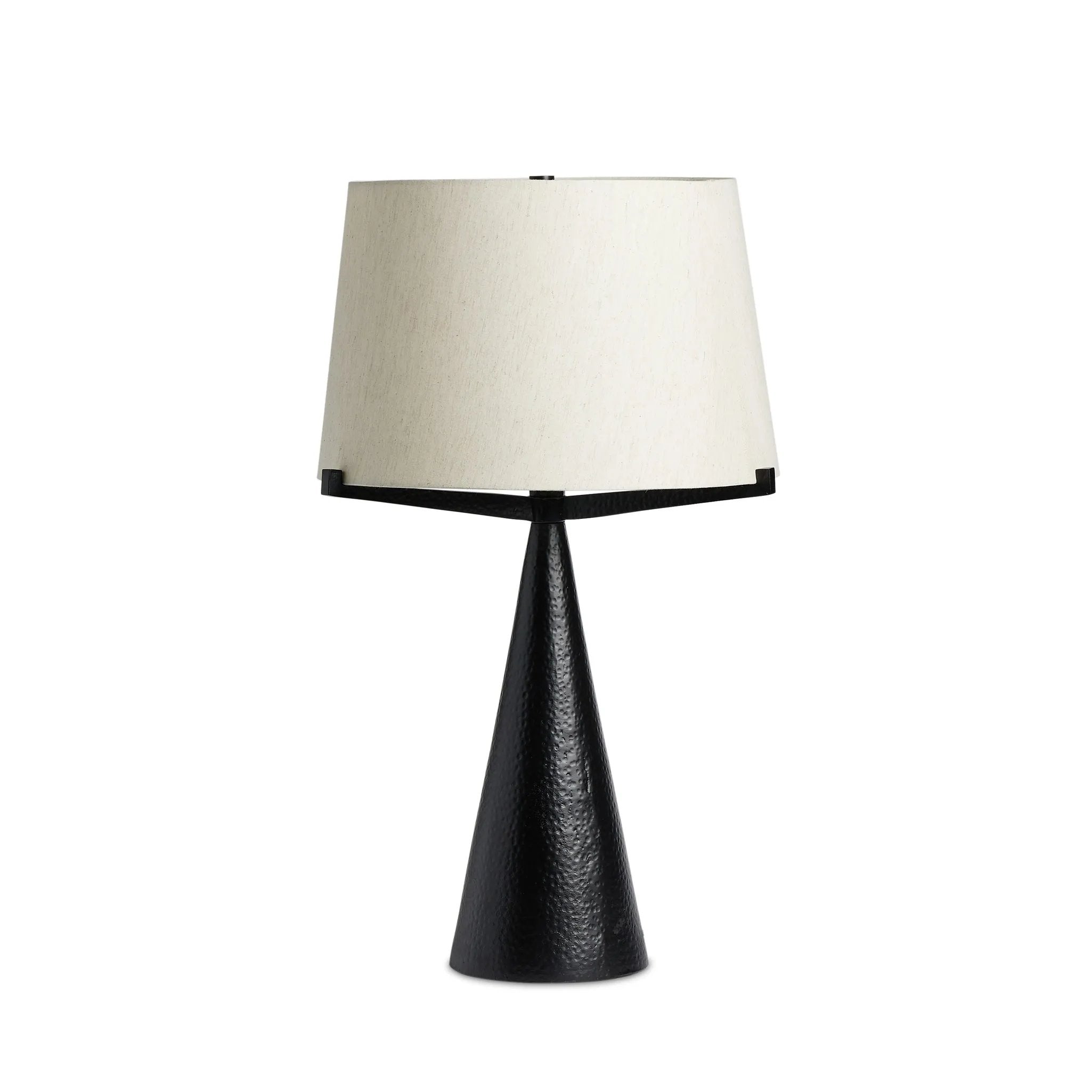 A tapered silhouette in black, hand-hammered aluminum gives this architectural table lamp its textured shape. A beige cotton shade adds a casual look with contrast Amethyst Home provides interior design, new home construction design consulting, vintage area rugs, and lighting in the San Diego metro area.