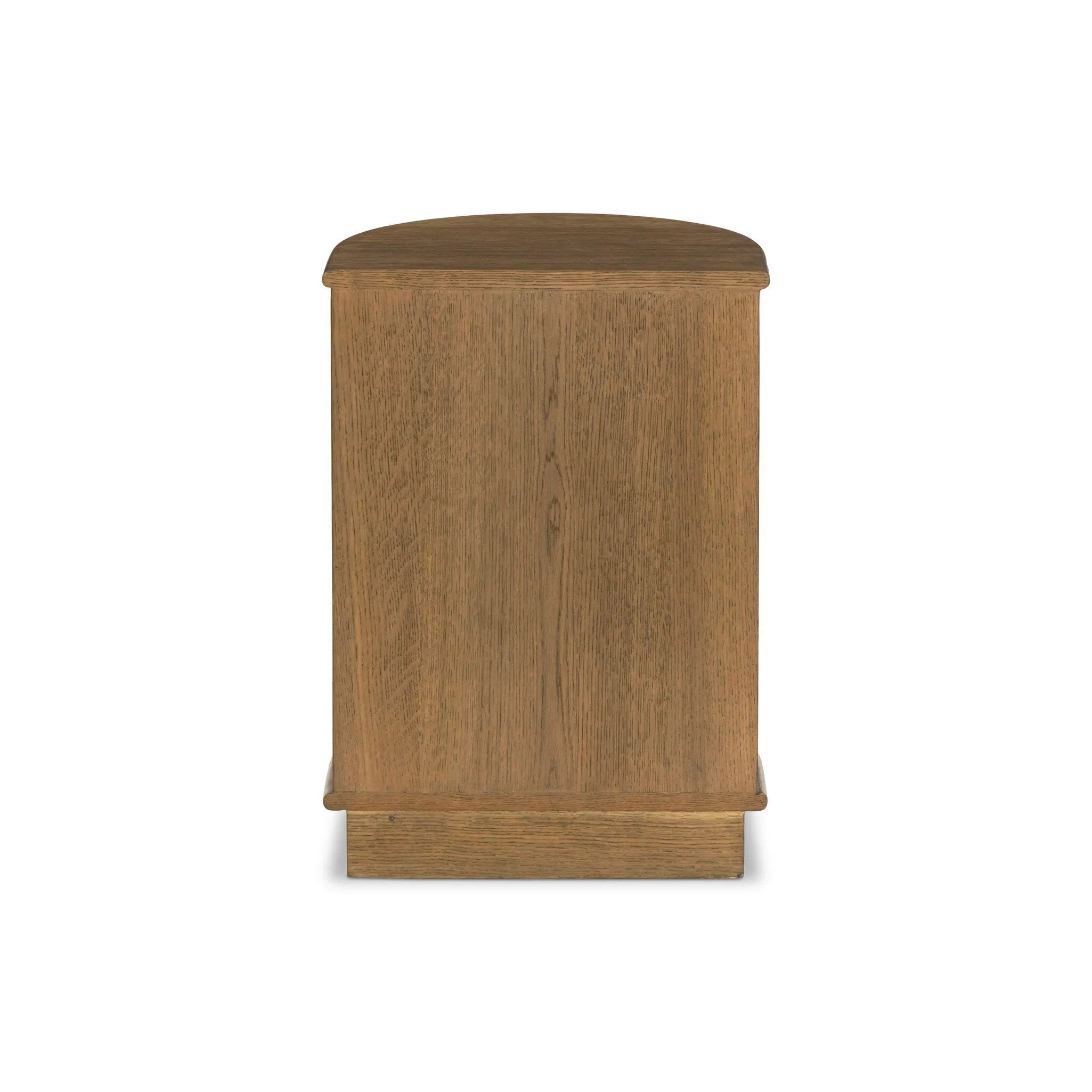 Modern with hints of heritage and Art Deco, crafted of warm, spiced oak. A flexible layering piece that can be styled just about anywhere — as a nightstand or in the entryway or hallway, its slight scale and demilune shape are great for smaller spaces, as its flat back can be styled right up against the wall. Amethyst Home provides interior design, new home construction design consulting, vintage area rugs, and lighting in the Alpharetta metro area.
