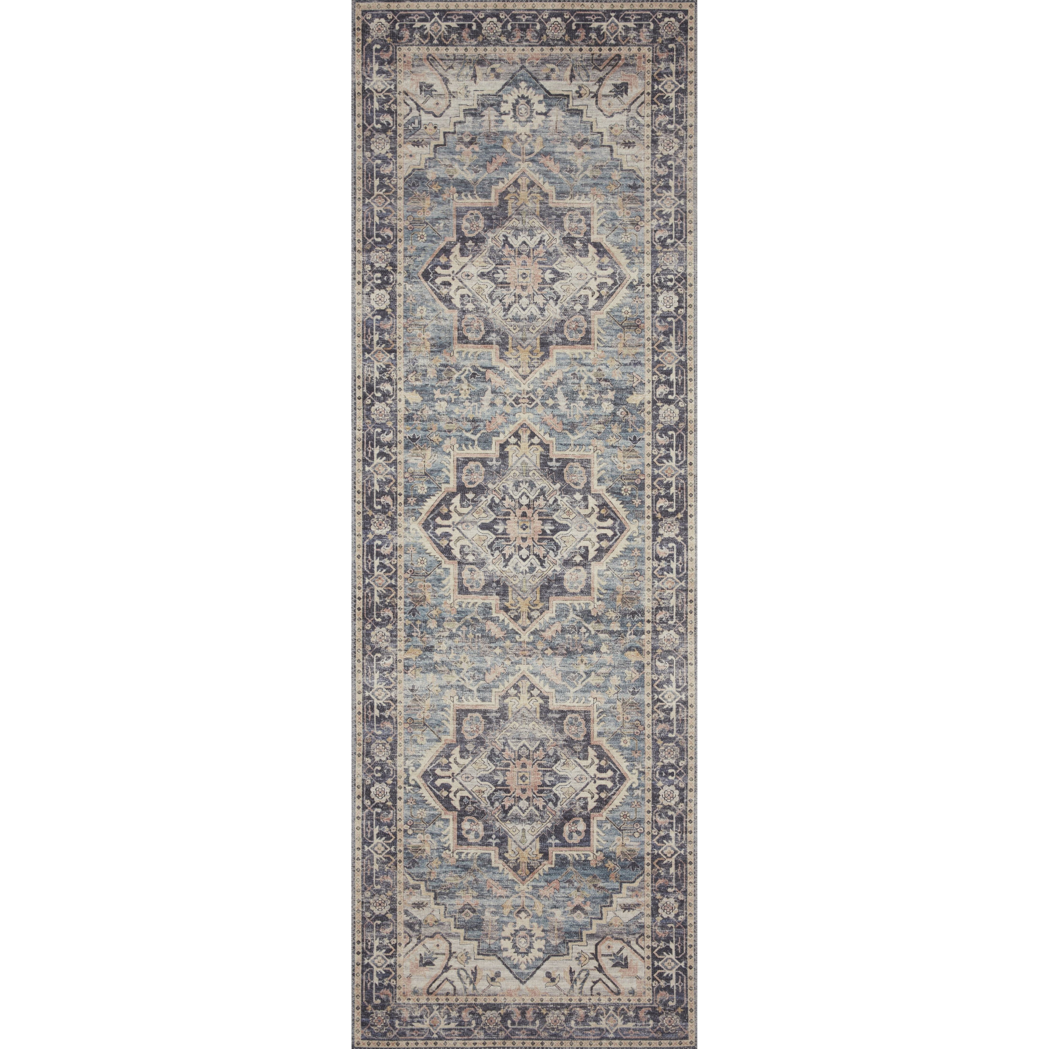 Featuring soft motifs in a carefully curated color palate of black, blue, yellow, and hints of orange, the Hathaway Navy / Multi area rug captures the essence of one-of-a-kind vintage or antique area rug. This rug is ideal for high traffic areas such as living rooms, dining rooms, kitchens, hallways, and entryways.