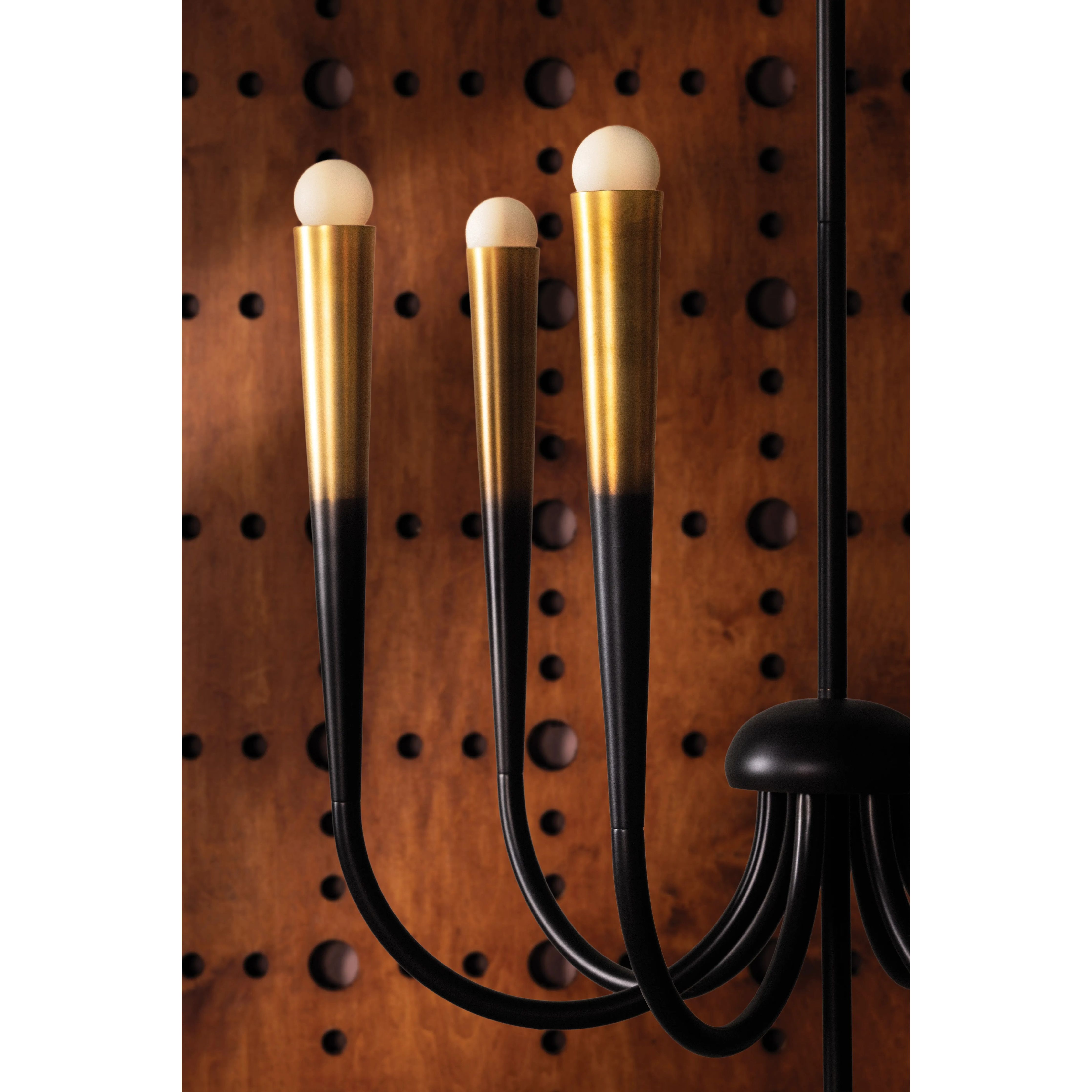 Adley is a sculptural, free-form family of fixtures with an inherent sense of fluidity. This soft take on geometric lighting leads you on a visual voyage with its unique Gradient Bronze finish. Transitioning from brass at the light source to a rich bronze, the metal frame draws the eye with its artistic ombre. Amethyst Home provides interior design, new home construction design consulting, vintage area rugs, and lighting in the Kansas City metro area.