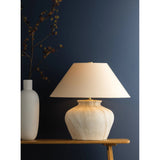 The Allards table lamp draws inspiration from traditional pottery and the beauty of artisan glazing. Its ceramic, urn-like silhouette is finished in Watercolor Sand with a painterly application that lends movement to the surface. Amethyst Home provides interior design, new home construction design consulting, vintage area rugs, and lighting in the Washington metro area.
