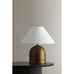 Made in India, Arvin introduces textural depth and warmth to a classic lamp form. There’s a noticeable play of light and shadow across the ridged surface of the domed base, creating movement and dimension. Patina Brass fittings and an off-white linen shade complement the earthy lamp base. Amethyst Home provides interior design, new home construction design consulting, vintage area rugs, and lighting in the Miami metro area.
