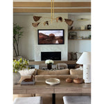 Characterized by its parchment-wrapped body, stitch detailing, and clasp-like Patina Brass accents, Bond is both relaxed and refined. Light filters through the tapered parchment shade, creating a warm, ambient glow that adds to the design's natural, organic feel. Amethyst Home provides interior design, new home construction design consulting, vintage area rugs, and lighting in the Calabasas metro area.