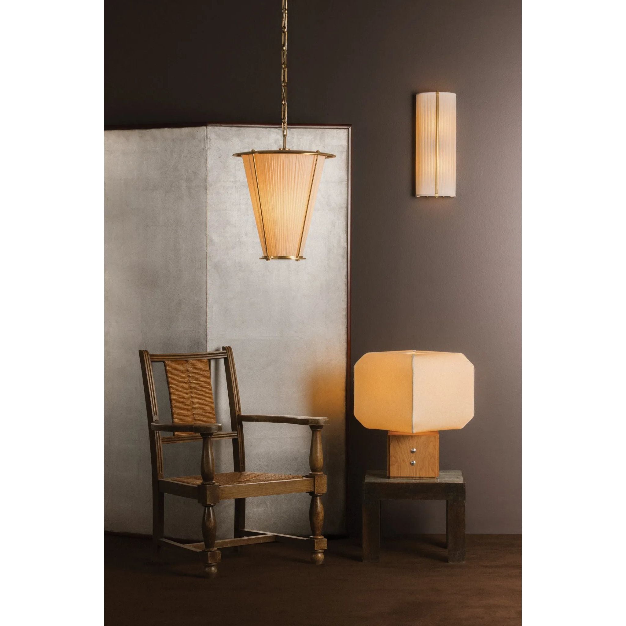 Brice is a study in contrast—pairing lightness and structure through a sculptural, design-forward silhouette. A handmade paper voluminous shade, appears to gently billow from its solid white oak base, evoking a sense of quiet movement. Decorative Polished Nickel buttons lend a subtle detail that elevates the piece with just the right edge Amethyst Home provides interior design, new home construction design consulting, vintage area rugs, and lighting in the Winter Garden metro area.