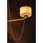 Playing with the concept of jewelry as installation, Bunda mixes structure and fluidity to create eye-catching drama. Finished in Vintage Brass, delicate rope chains dangle and loop across the streamlined arms of this 3- or 9-light chandelier. Amethyst Home provides interior design, new home construction design consulting, vintage area rugs, and lighting in the Charlotte metro area.